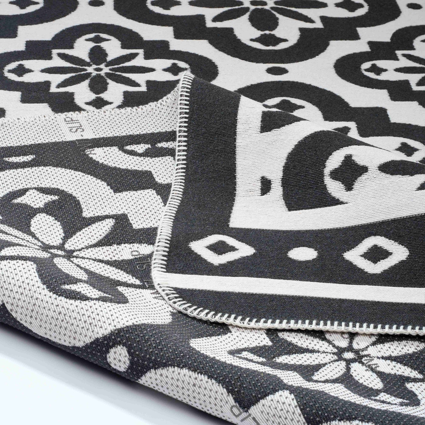 Arya Neo Black White Rug - Front and Back View | Artistry Home