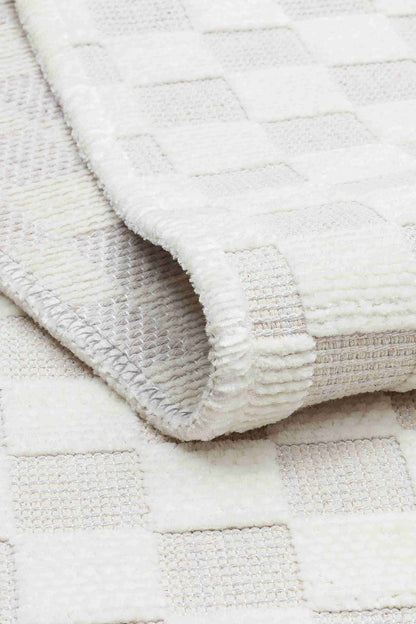 Ada Cream Rug - Folded to Show Pattern and Texture | Artistry Home