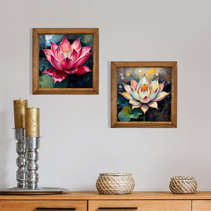 Two framed paintings of lotus flowers on a wall above a wooden cabinet with decorative items.