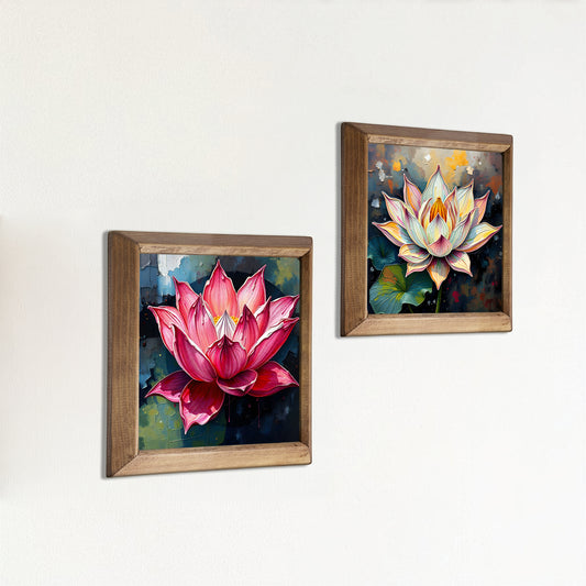 Two framed paintings of lotus flowers on a white wall.