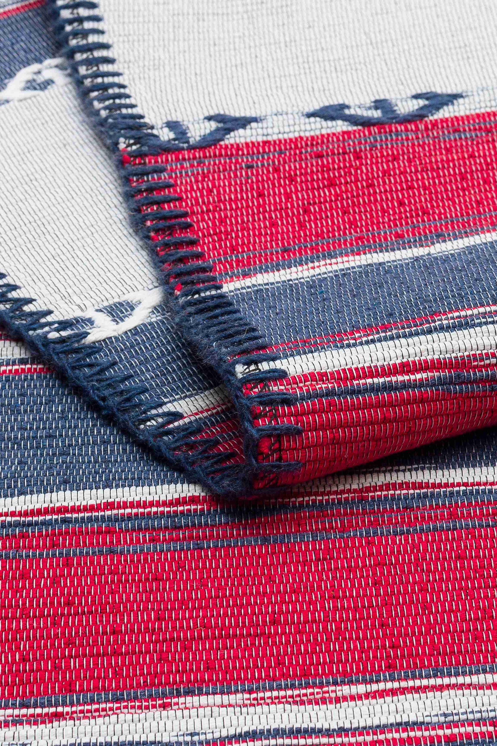 Arya Craft Navy Rug - Folded to Show Pattern and Texture | Artistry Home