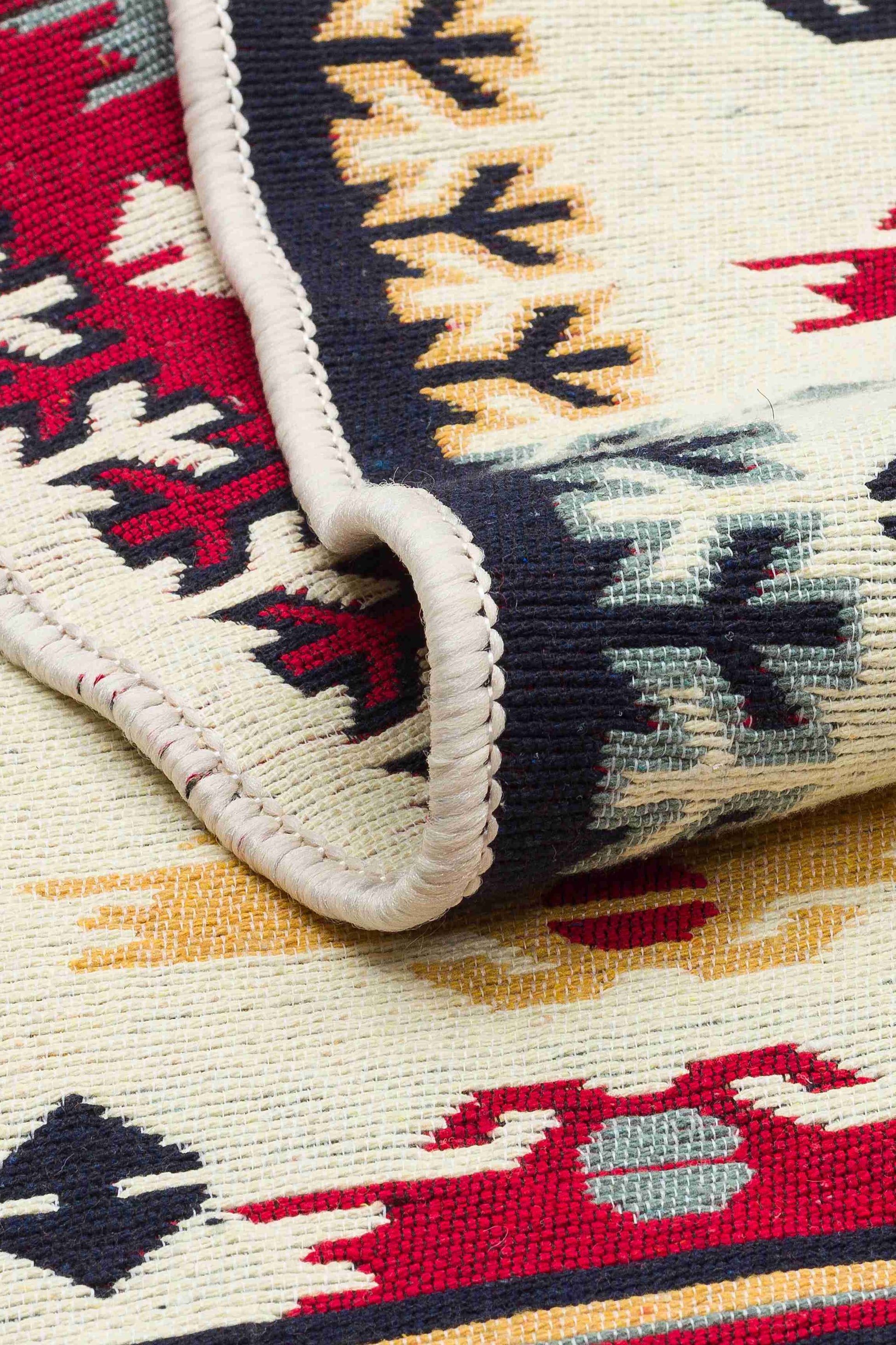 Arya Red Mosaic Rug - Folded to Show Pattern and Texture | Artistry Home