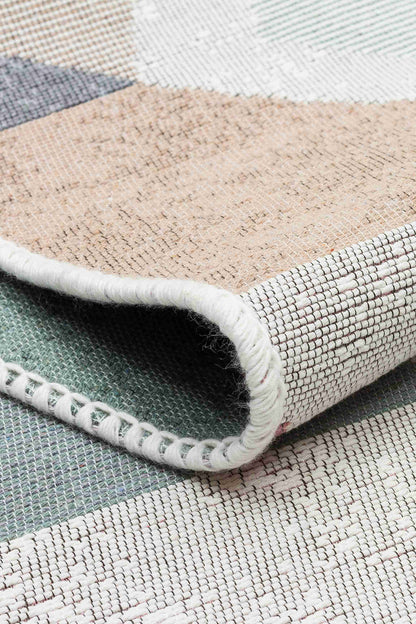 Arya Blue Pink Rug - Folded to Show Pattern and Texture | Artistry Home