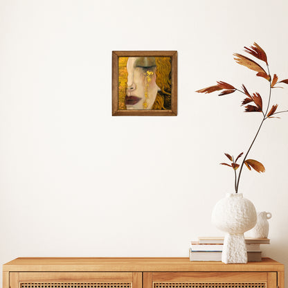 Framed artwork on a wall above a wooden console table with decorative items.