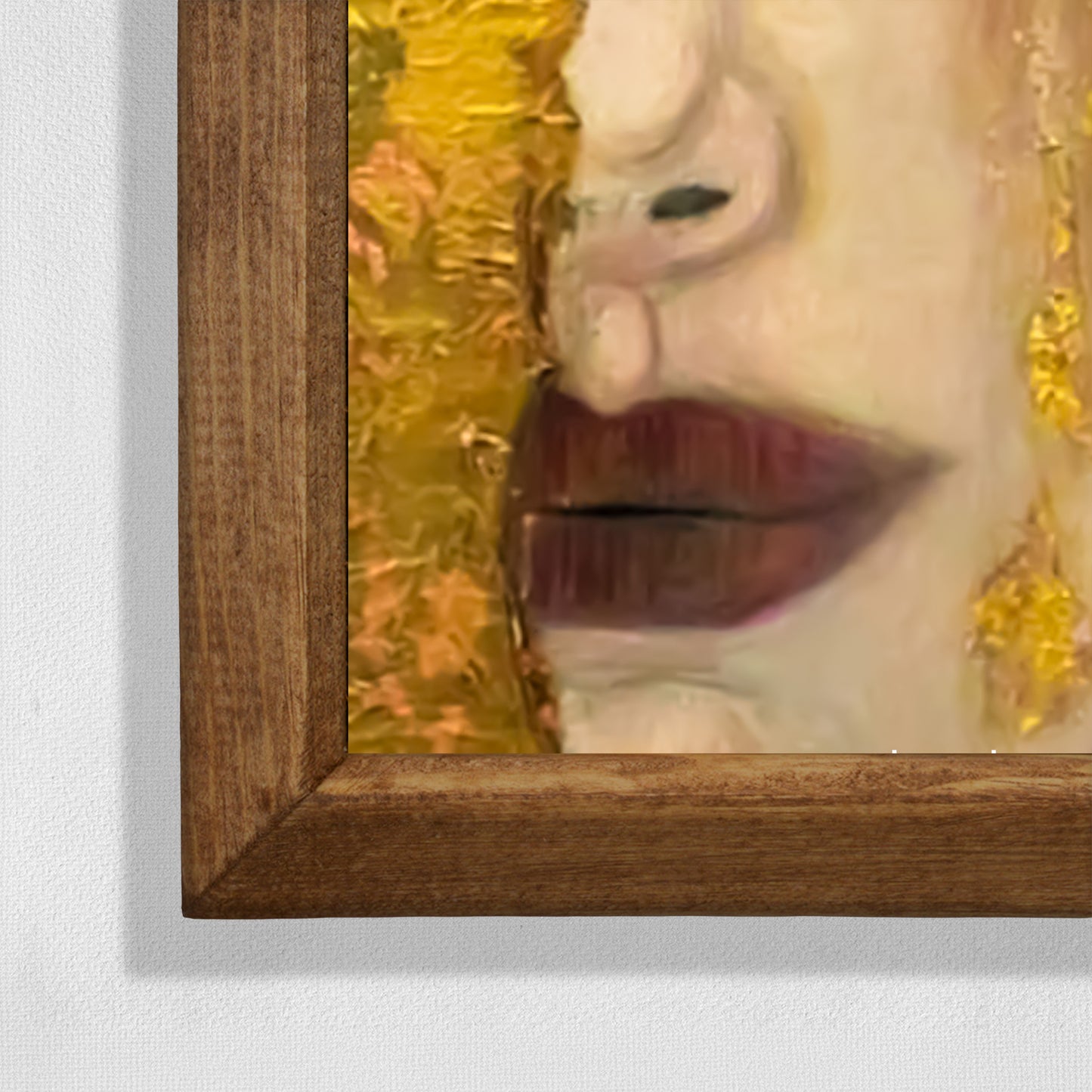 Close-up of a painting with a focus on a woman's lips and gold leaf background.
