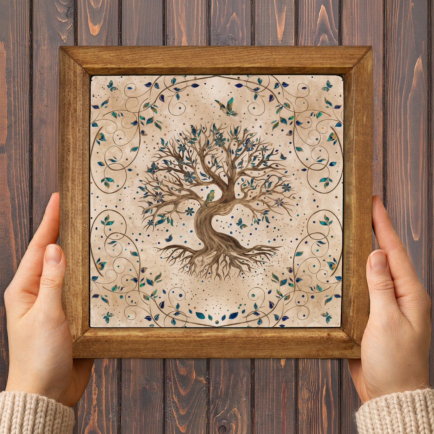Framed artwork of a tree with intricate designs on a wooden background