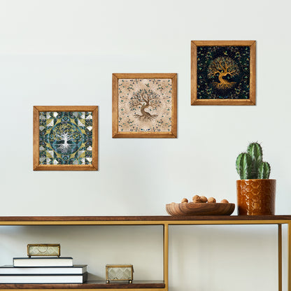 Three framed artworks on a wall above a wooden shelf with decorative items.