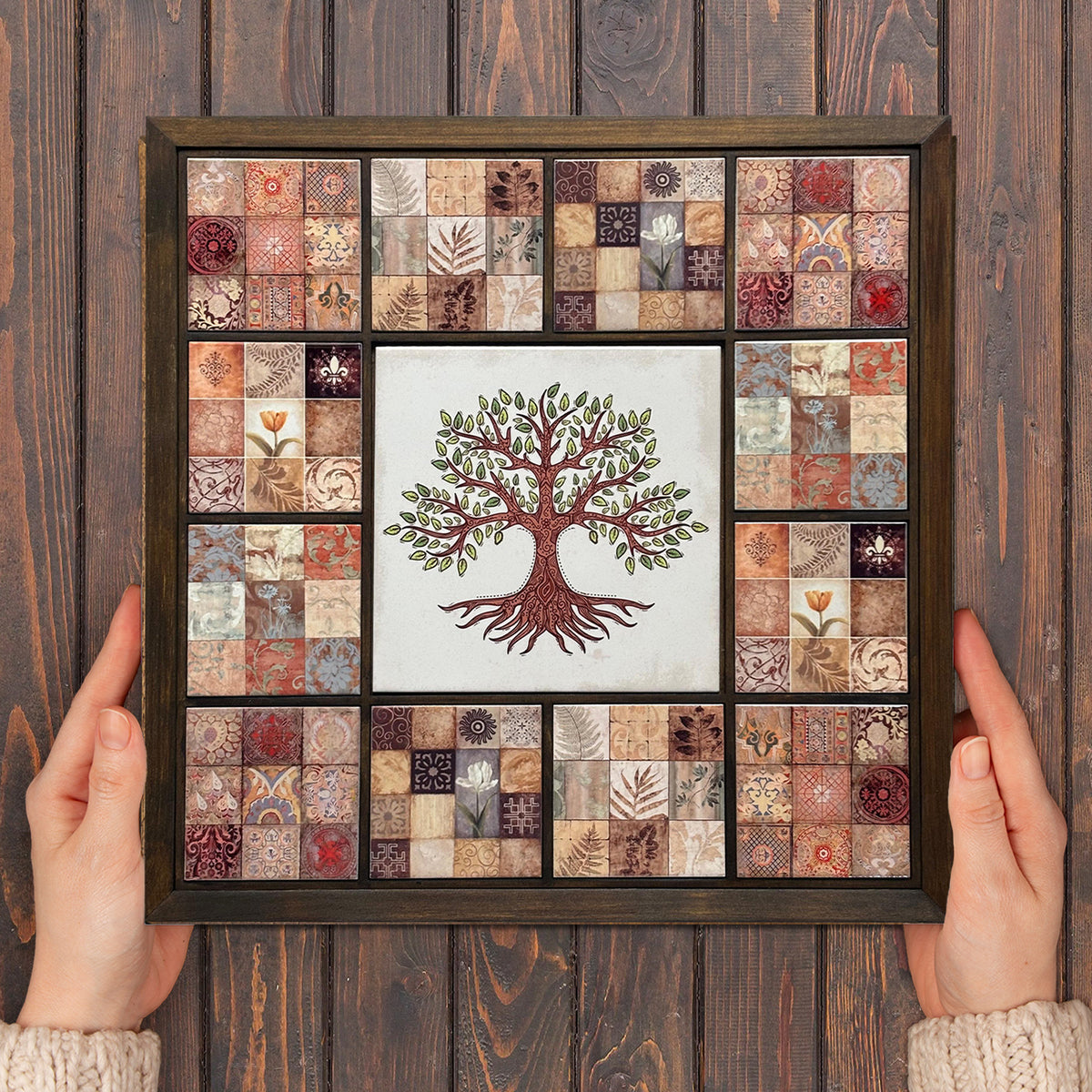 Framed artwork with a tree design on a wooden background