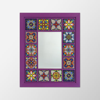 Decorative mirror with colorful geometric patterns in a purple frame on a white background