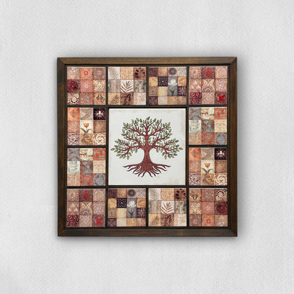 Framed artwork with a tree design on a patchwork background